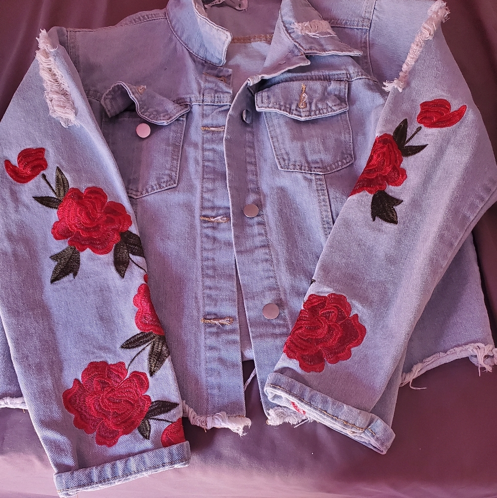 Distressed rose denim jacket